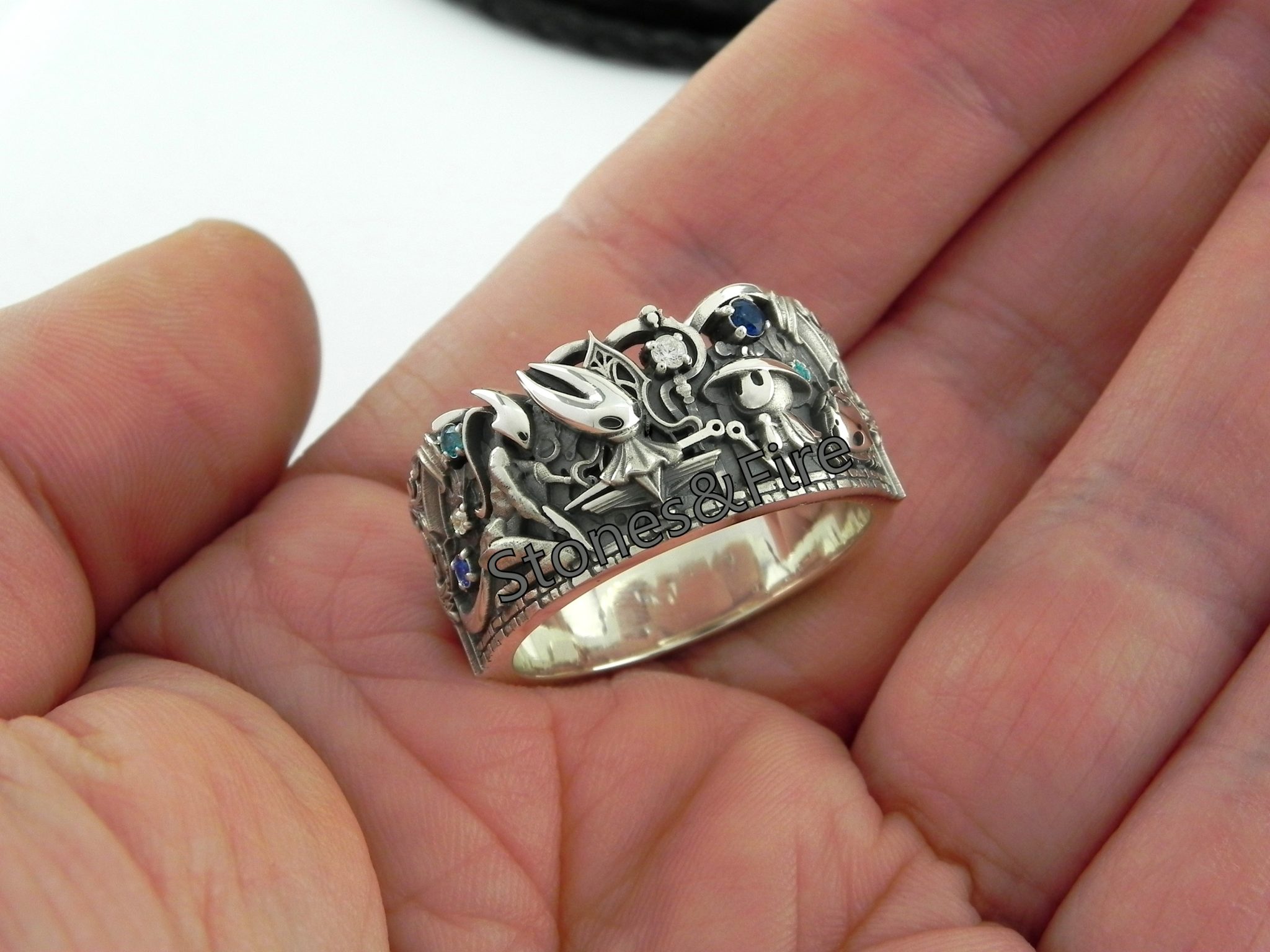 This custom Ring is a fan art designed and made by Stones&Fire. Inspired by animation and playing games. More info you may find in its description.